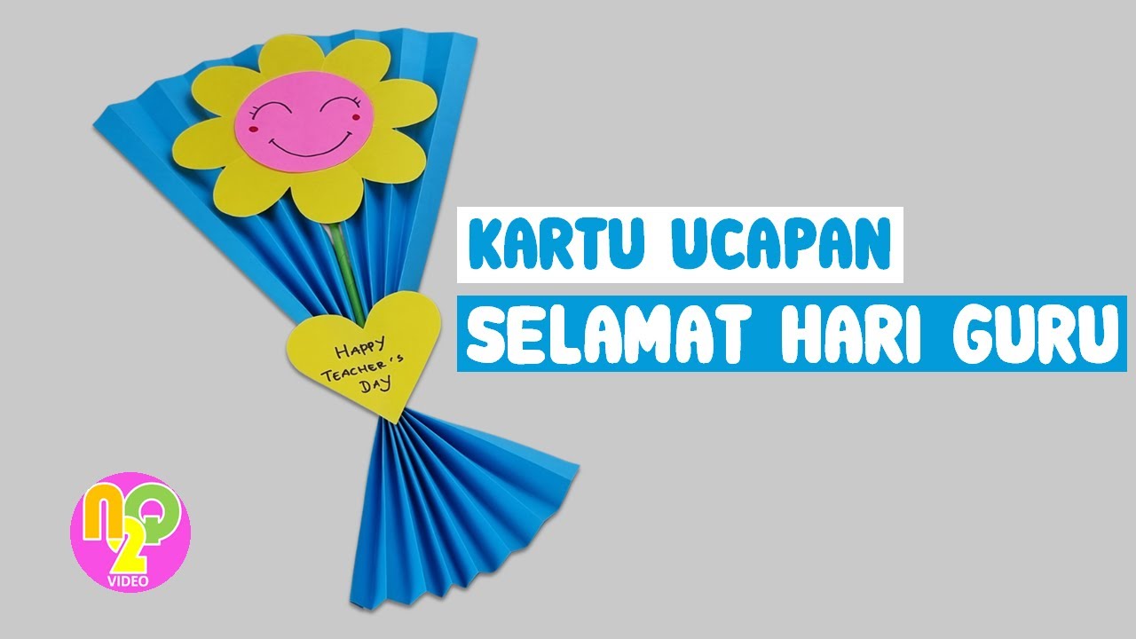 Anak-anak membuat kartu ucapan kreatif untuk Hari Guru di kelas sekolah